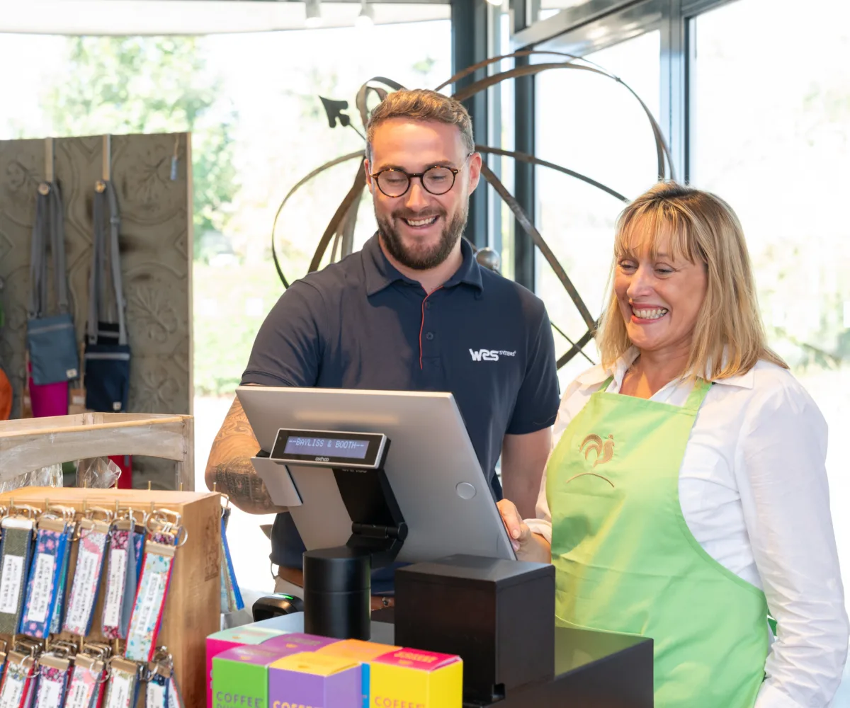 Baylis Smiling at till with Craig from WRS