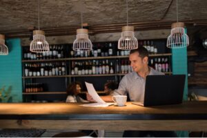 Man in Back Office POS Software